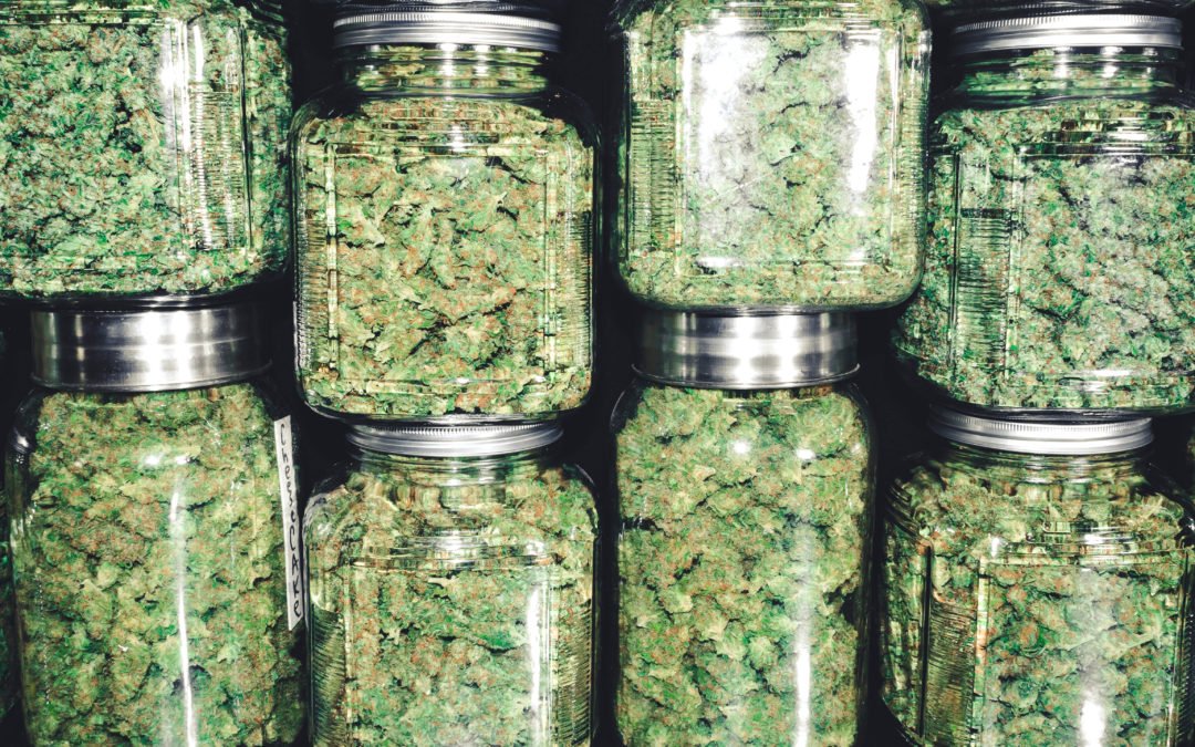Marijuana Buds in Glass Jar Stack